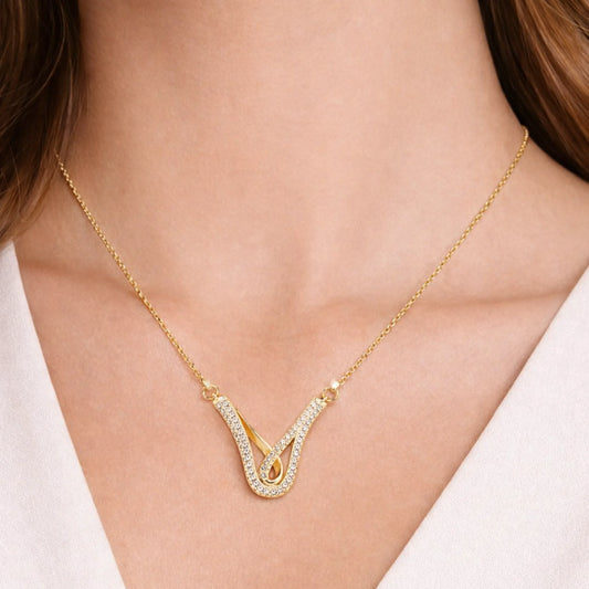 Model wearing Yubiraa Aura Loop Necklace showcasing minimal gold plated pendant perfect for daily wear jewellery