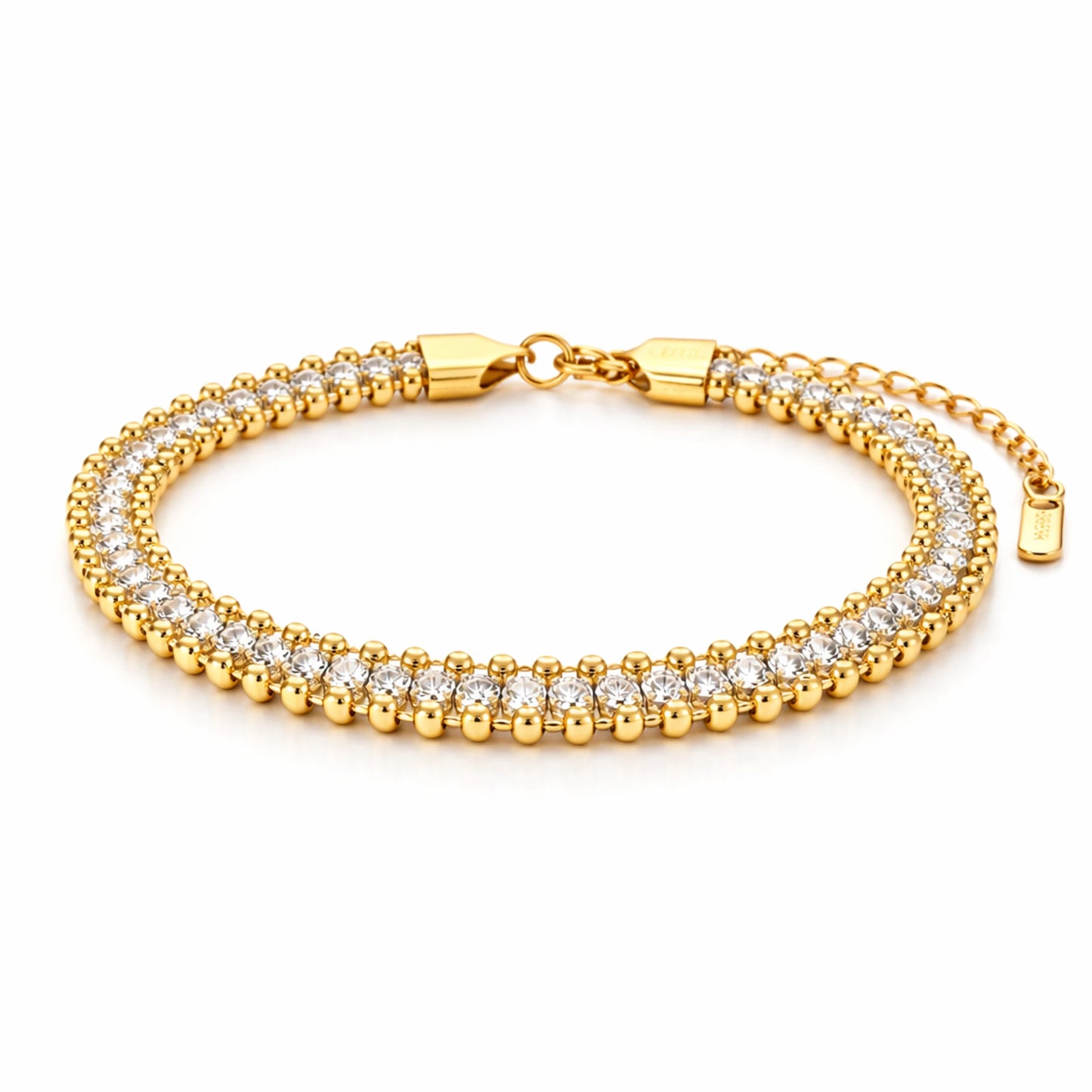 Gold bracelet with clear stones on a white background