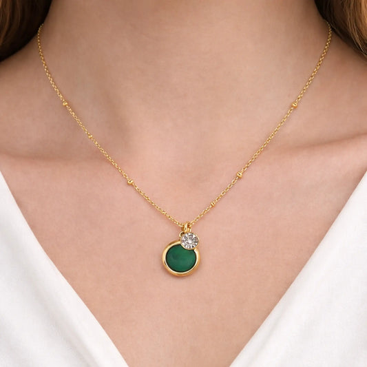 Yubiraa Anti tarnish gold plated emerald halo necklace worn by model