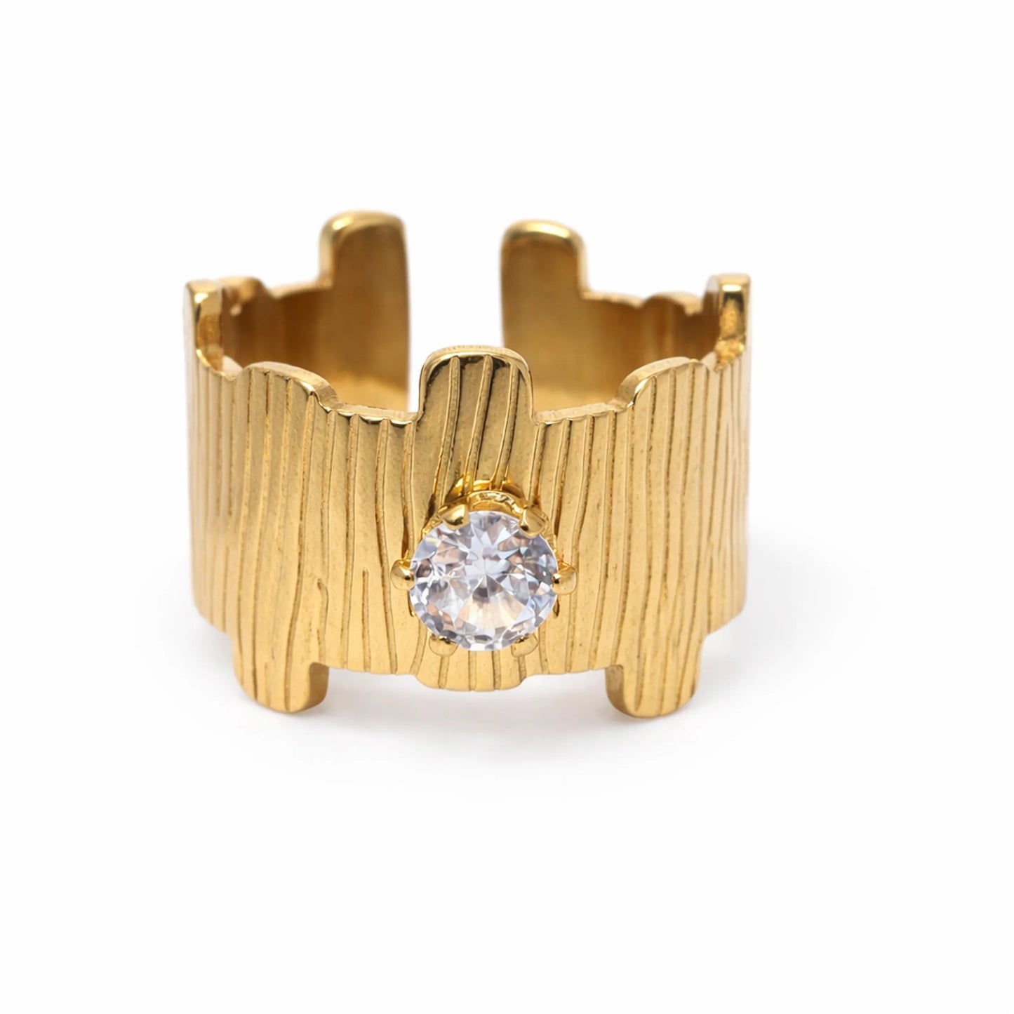 Textured gold plated ring with a round solitaire stone, angled three-quarter view on a white background