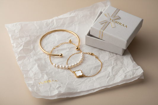 Best bracelet gifts for working women India 2026 — gold, pearl and clover bracelets as elegant gift ideas by YUBIRAA, anti-tarnish 18K gold PVD plating