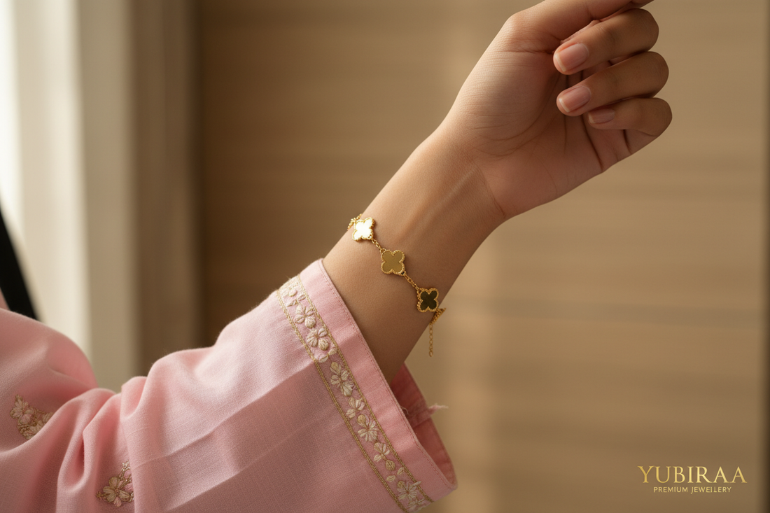 Best bracelets to wear with kurta to office India — delicate gold clover bracelet with pastel kurta, Indian office wear styling by YUBIRAA, anti-tarnish 18K gold PVD