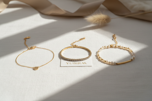 How to choose the perfect bracelet for your wrist size and personal style — minimalist, tennis and pearl gold bracelets by YUBIRAA, anti-tarnish 18K gold PVD plating