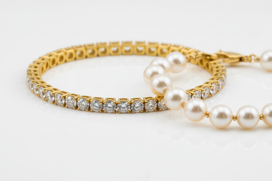 Tennis bracelet vs pearl bracelet comparison — sparkling tennis bracelet and delicate pearl bracelet by YUBIRAA, anti-tarnish 18K gold PVD plating
