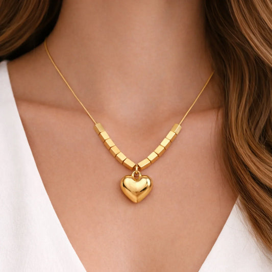 Statement necklace vs minimalist necklace — YUBIRAA anti-tarnish 18K gold PVD golden heart statement necklace comparison guide