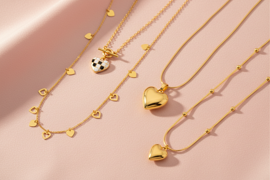 How to choose the perfect heart necklace for her — YUBIRAA anti-tarnish 18K gold PVD heart necklaces flat lay gift guide