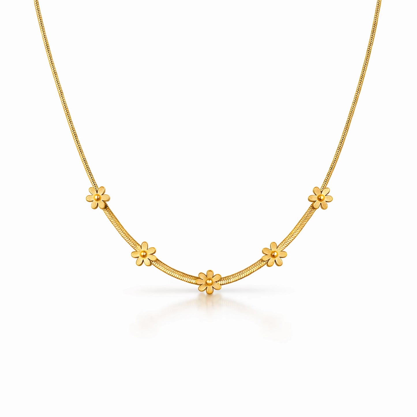 Gold necklace with floral designs on a white background