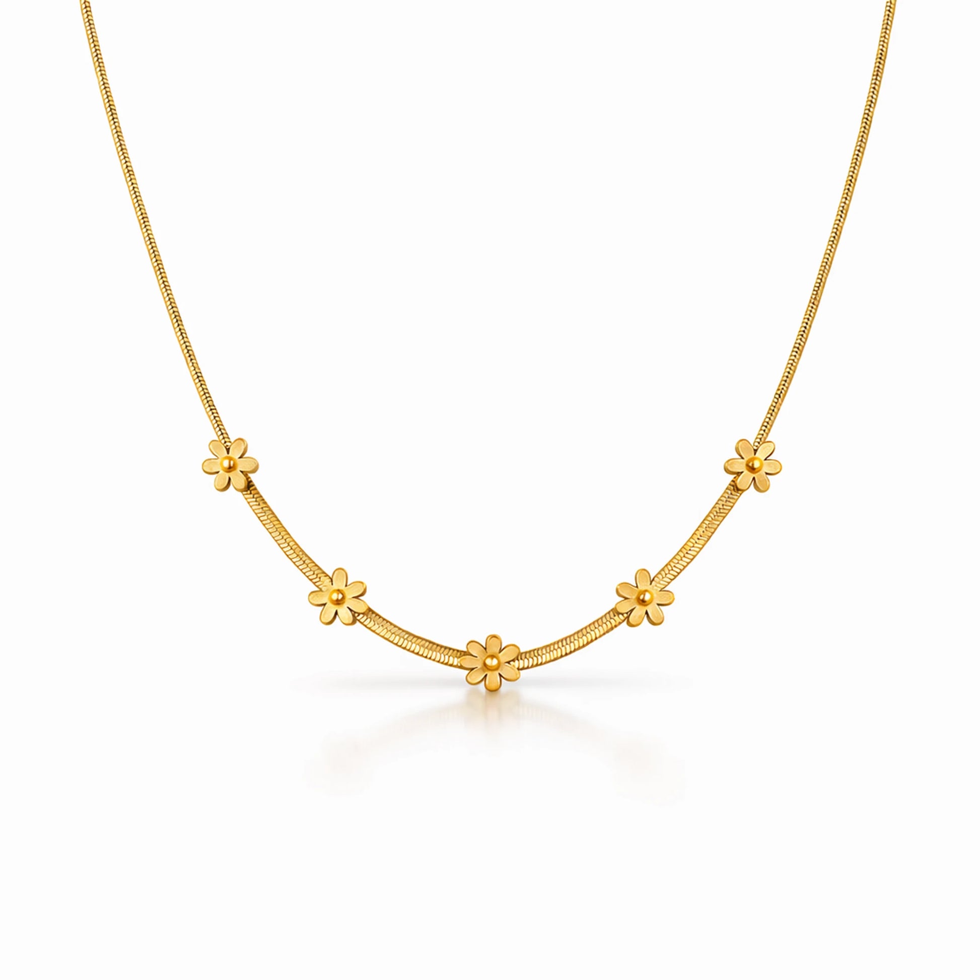 Gold necklace with floral designs on a white background