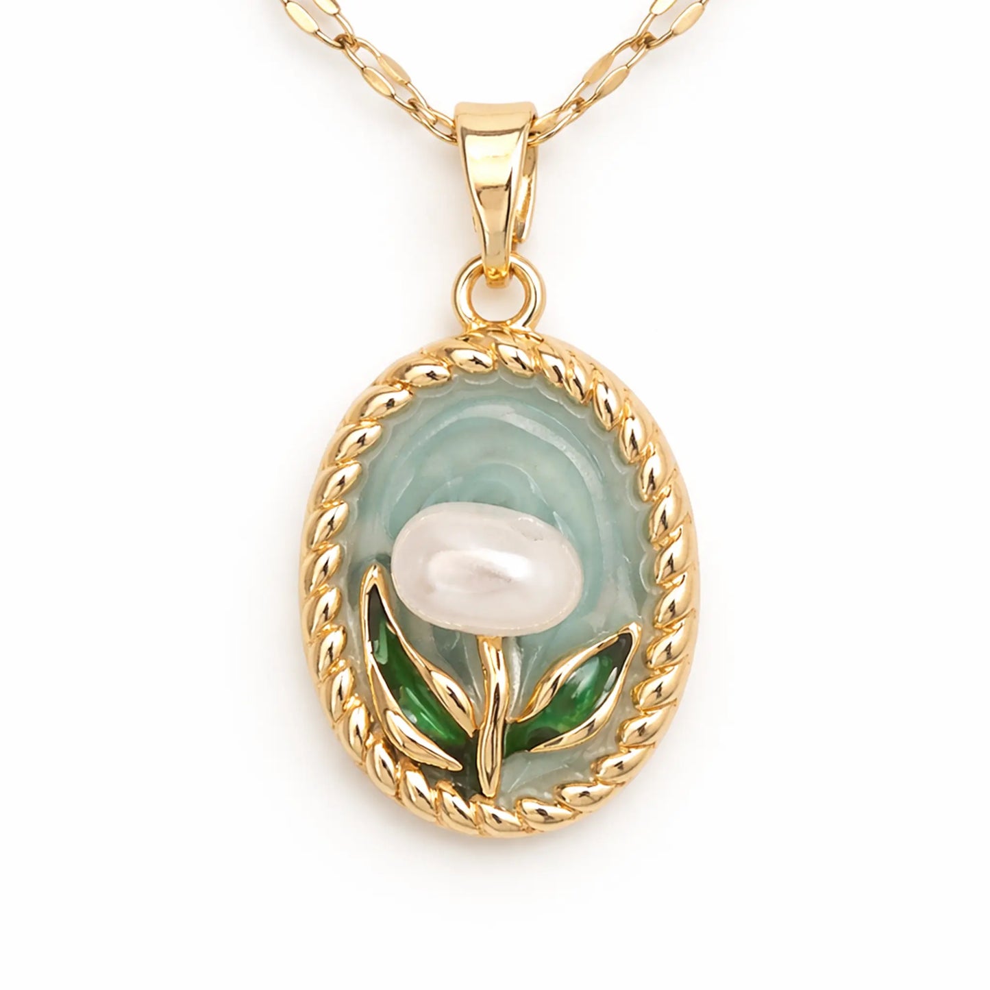 Close-up view of anti tarnish gold plated floral pendant necklace featuring pearl detail, enamel leaves, and premium gold finish.