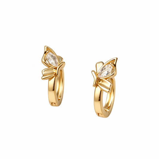 Gold hoop earrings with butterfly design and clear gemstones on a white background