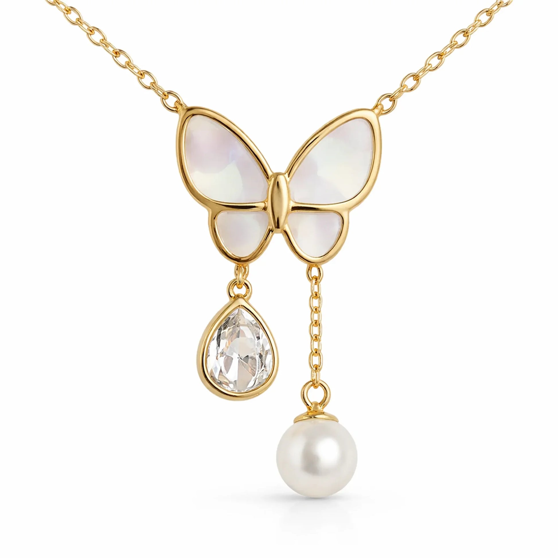 Close-up of butterfly pendant necklace in gold tone featuring mother-of-pearl wings, crystal drop and pearl chain detail