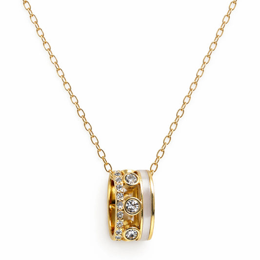 Gold necklace with a circular pendant featuring diamonds on a white background