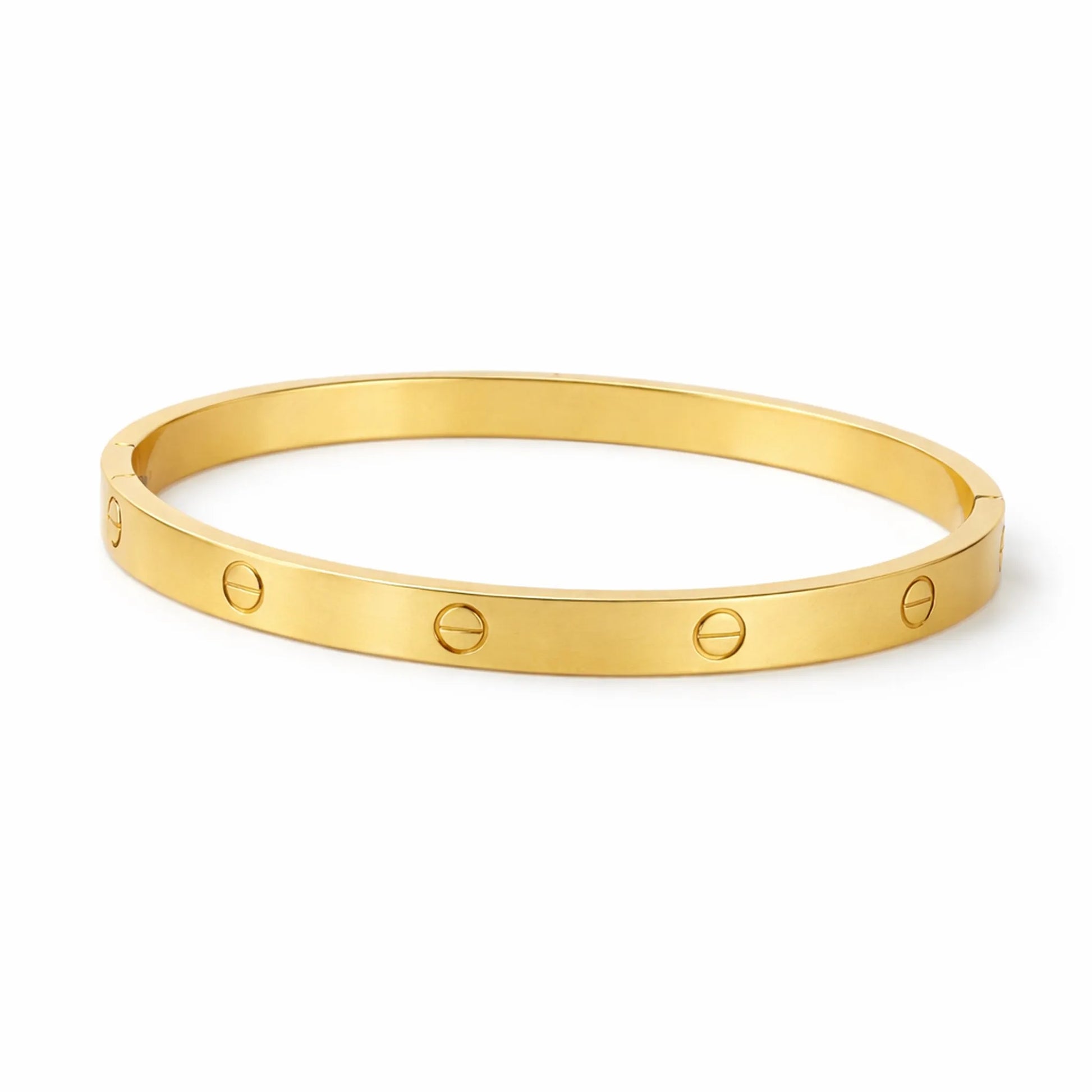 Gold bracelet with engraved design on a white background