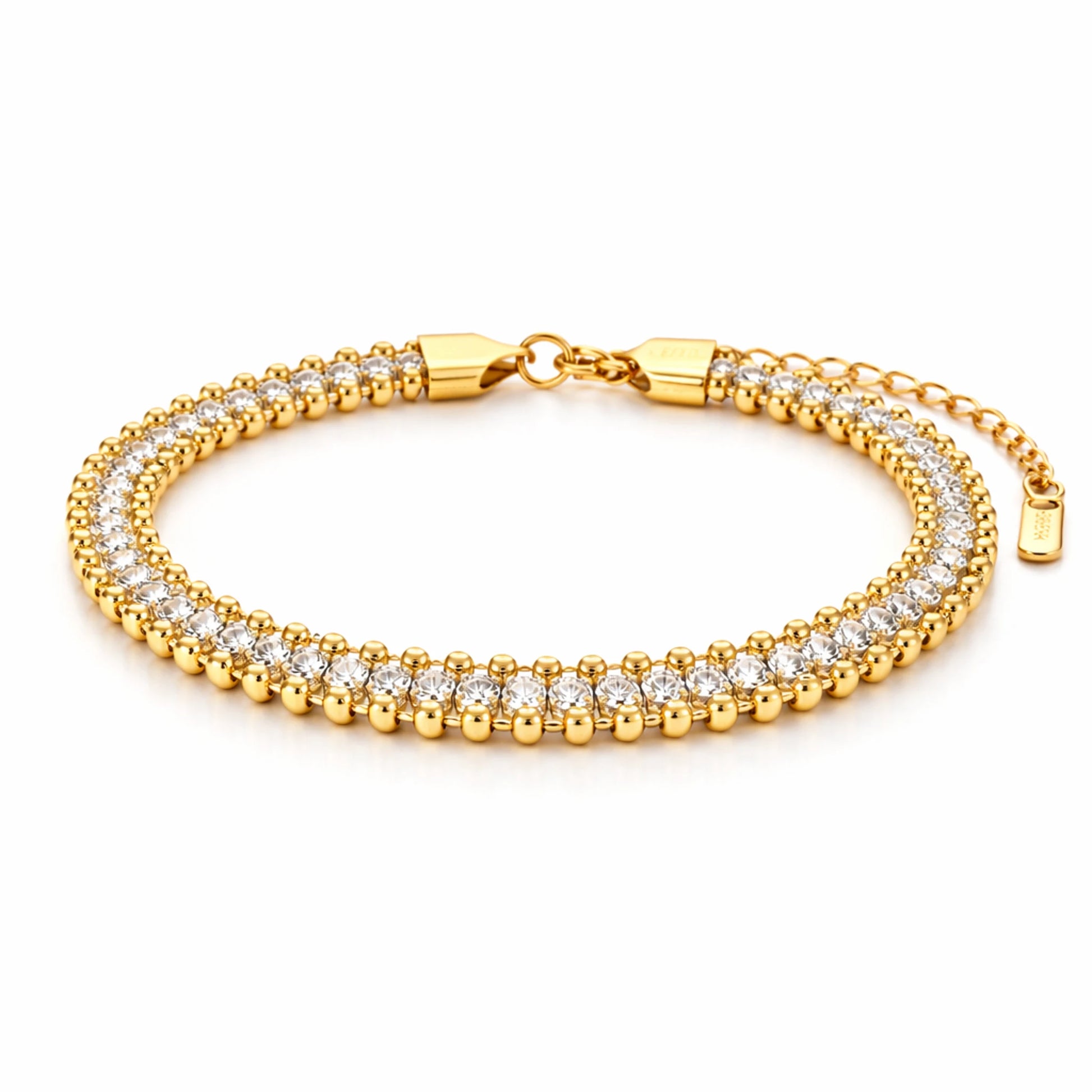 Gold bracelet with clear stones on a white background