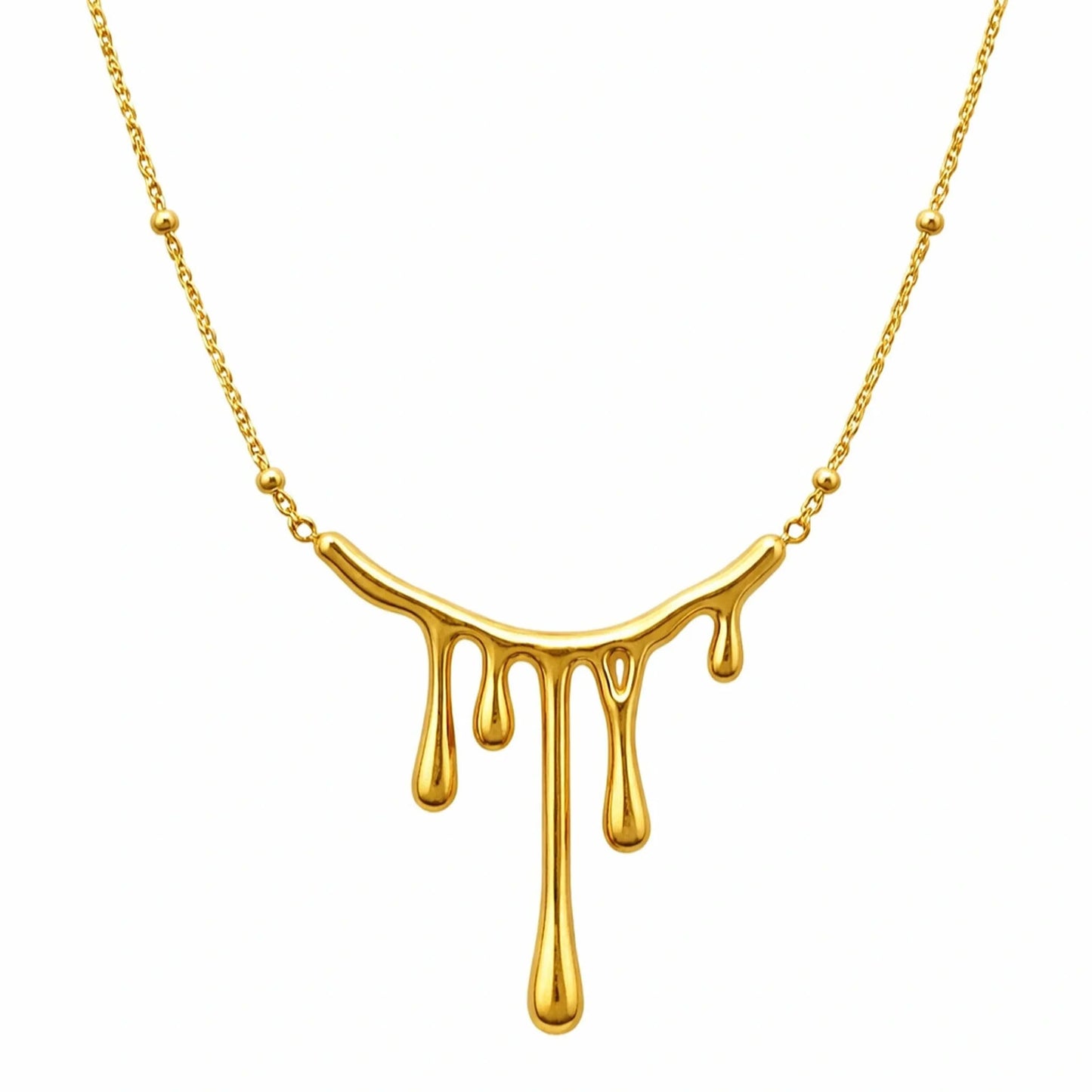 Gold necklace with a unique design on a white background