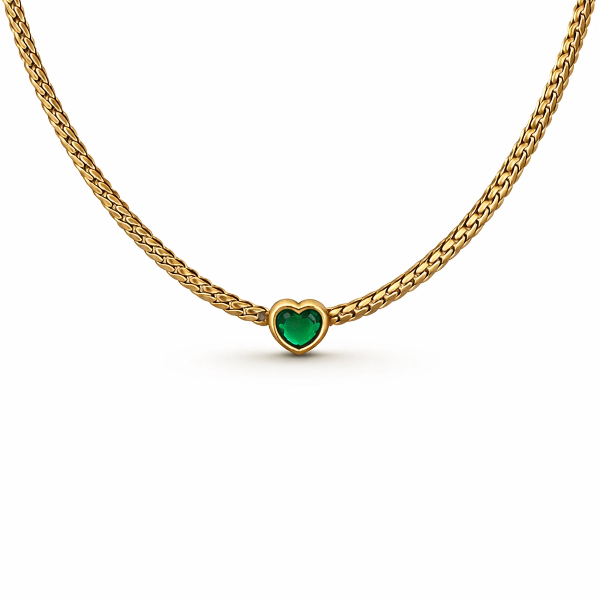 Gold necklace with a heart-shaped green gemstone on a white background