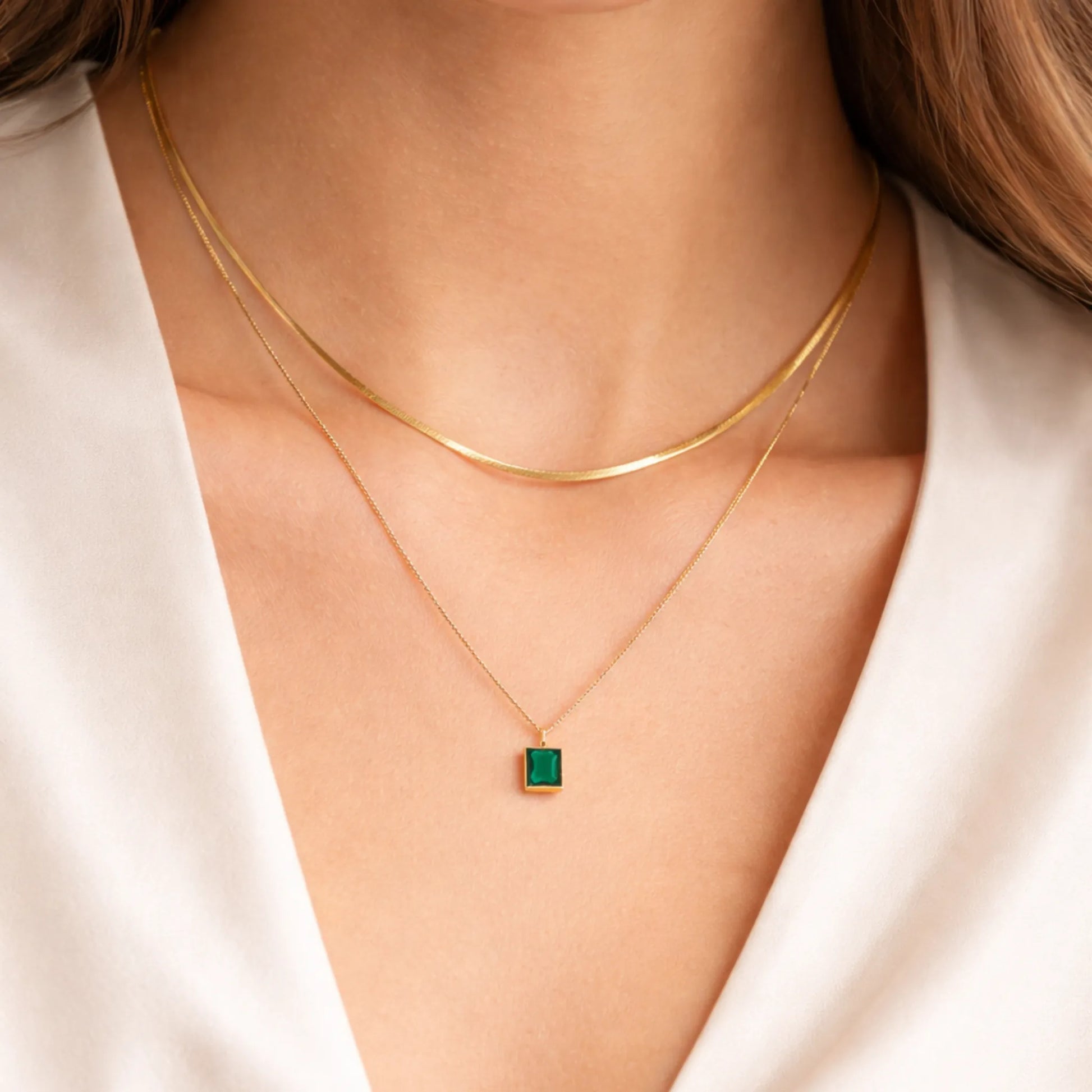 YUBIRAA emerald layered gold necklace in double layer worn on neck, minimal anti tarnish jewellery for everyday wear