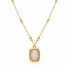 Ethereal Rose pendant necklace in gold plated stainless steel with ivory engraved rose charm on white background