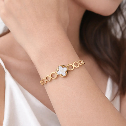 Model wearing YUBIRAA Everyday Clover Gold Bracelet styled for elegant everyday wear