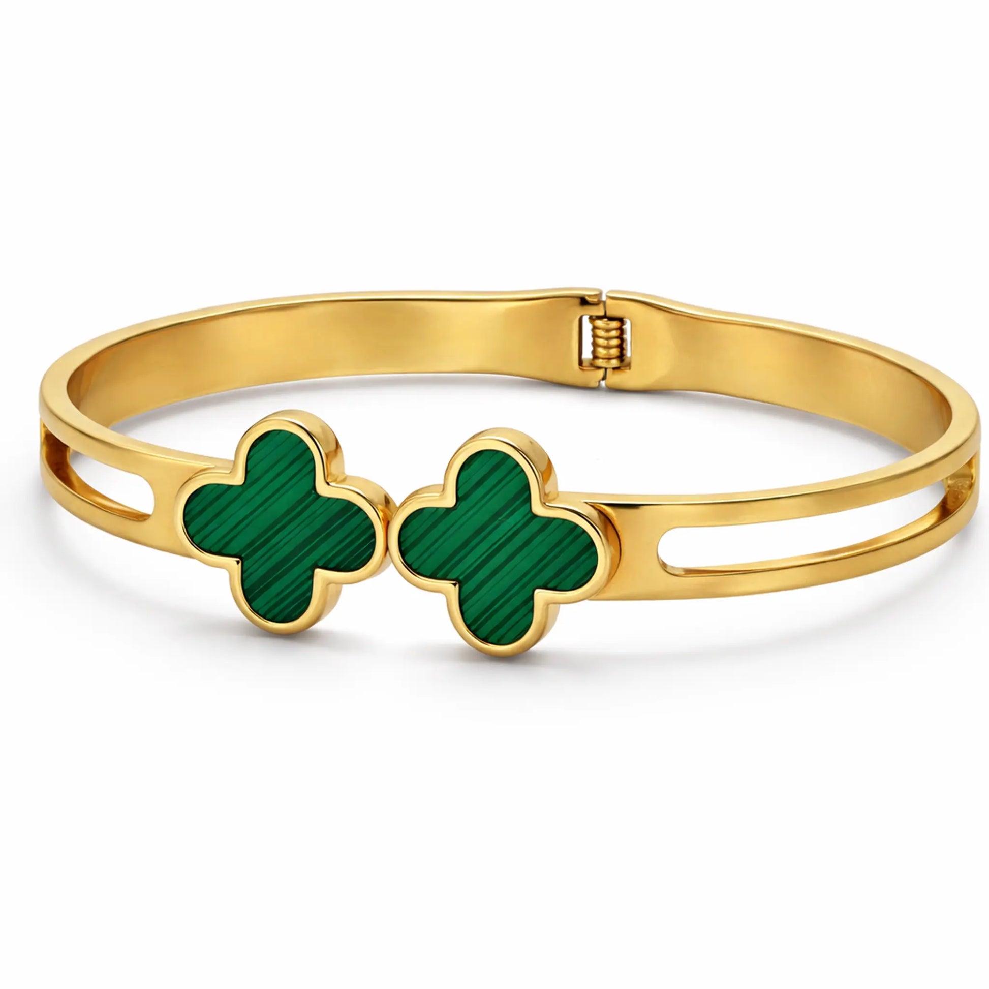 Side angle view of YUBIRAA green clover bangle showing sleek gold band design