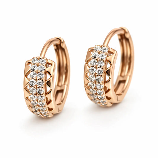 Anti-tarnish gold plated pavé hoop earrings with cubic zirconia detailing displayed as a front pair on a white background