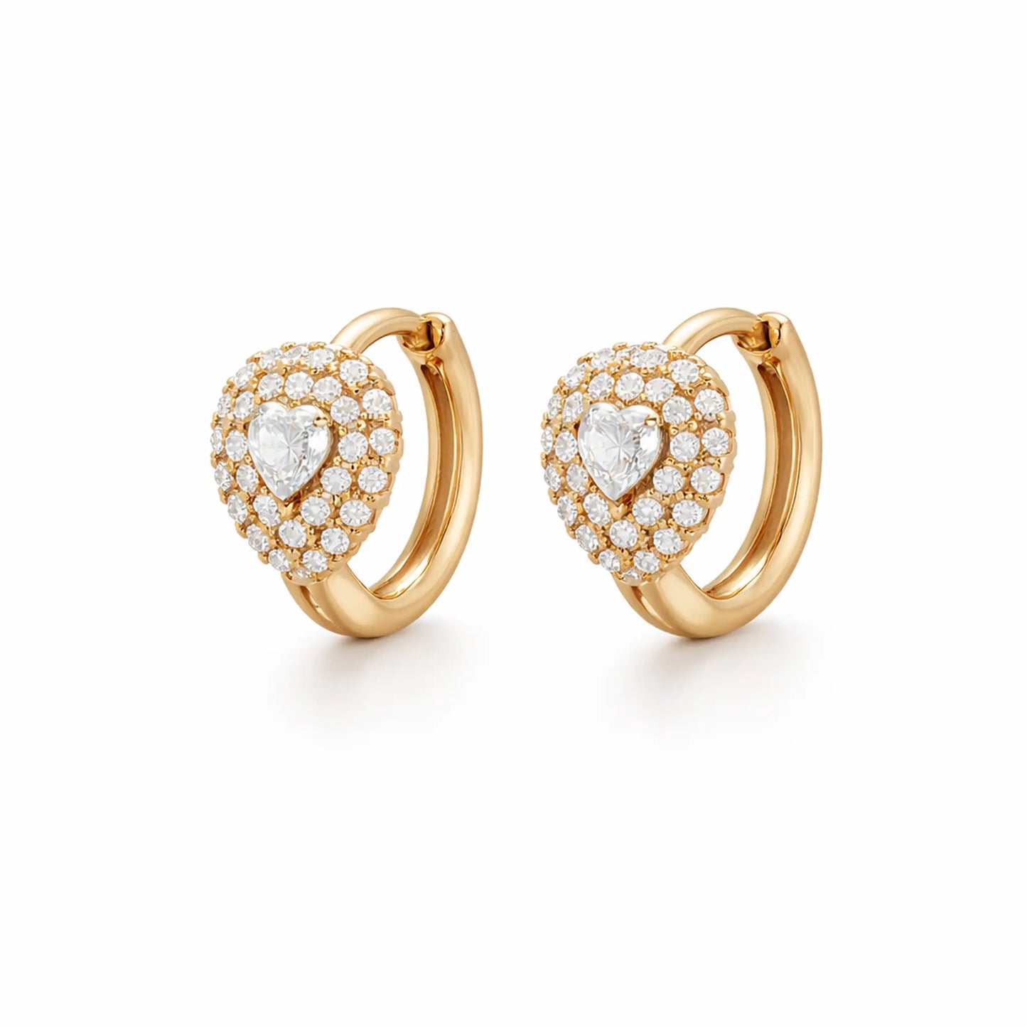 Angled view of anti tarnish gold polish heart crystal hoop earrings with crystal halo design