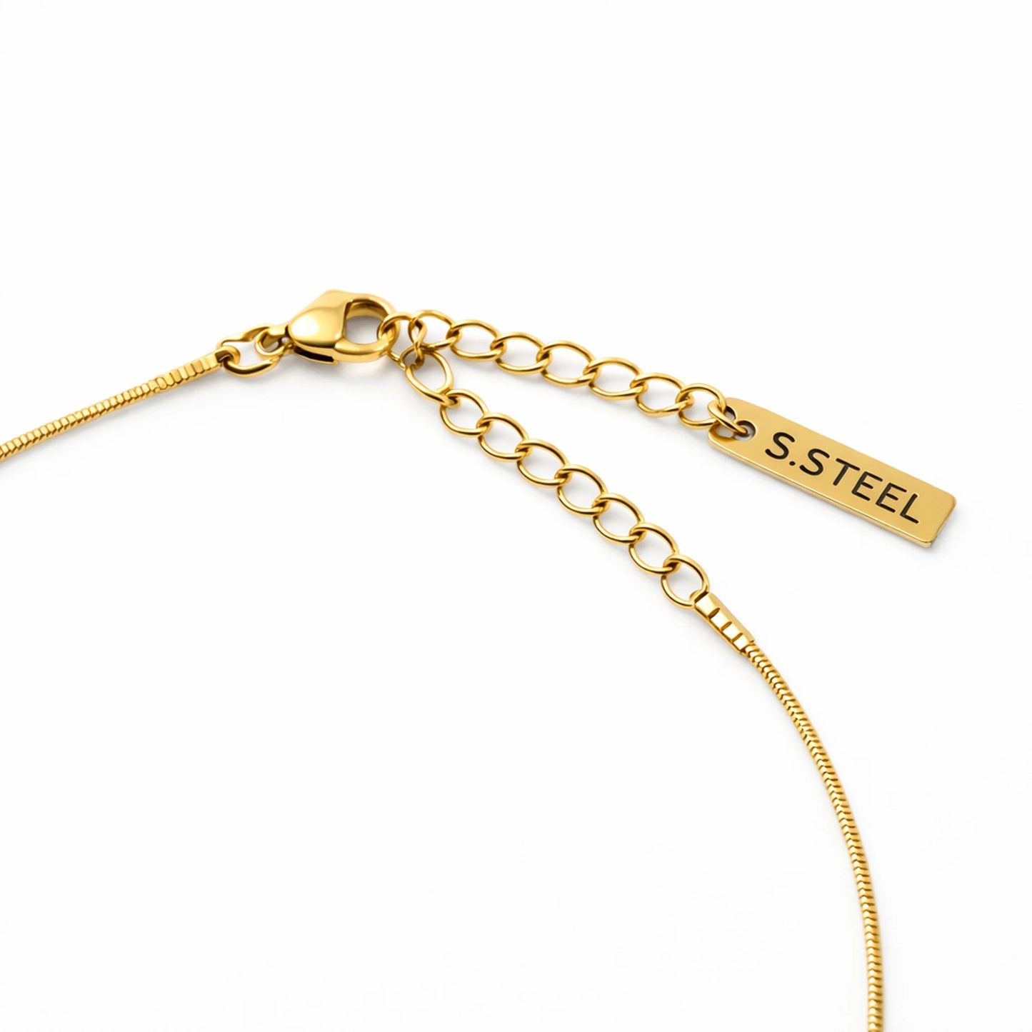 Gold bracelet with a 'S. Steel' tag on a white background