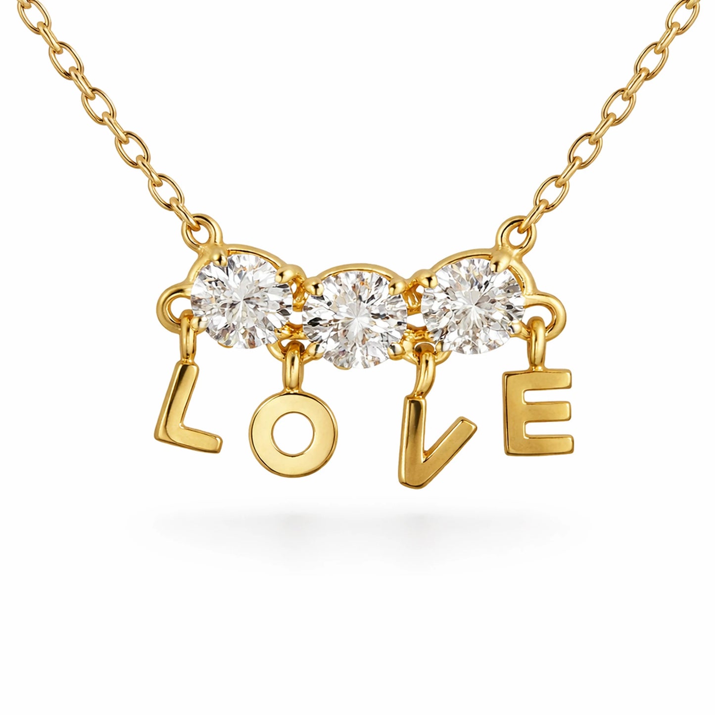 Close up of gold LOVE charm necklace with sparkling cubic zirconia stones and dangling letters