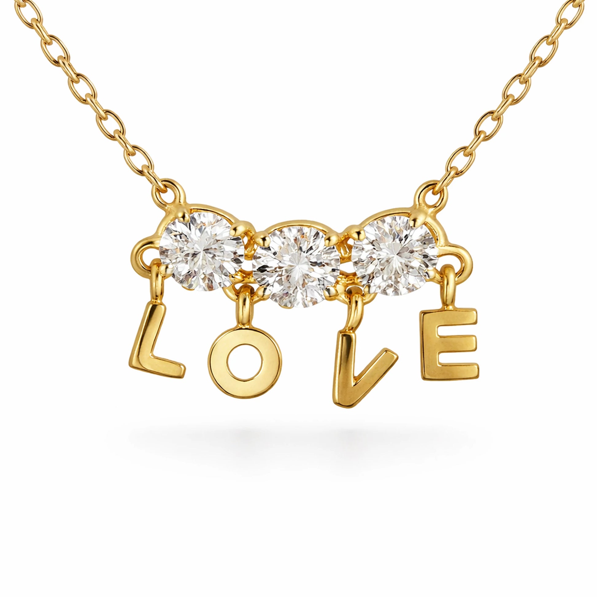 Close up of gold LOVE charm necklace with sparkling cubic zirconia stones and dangling letters