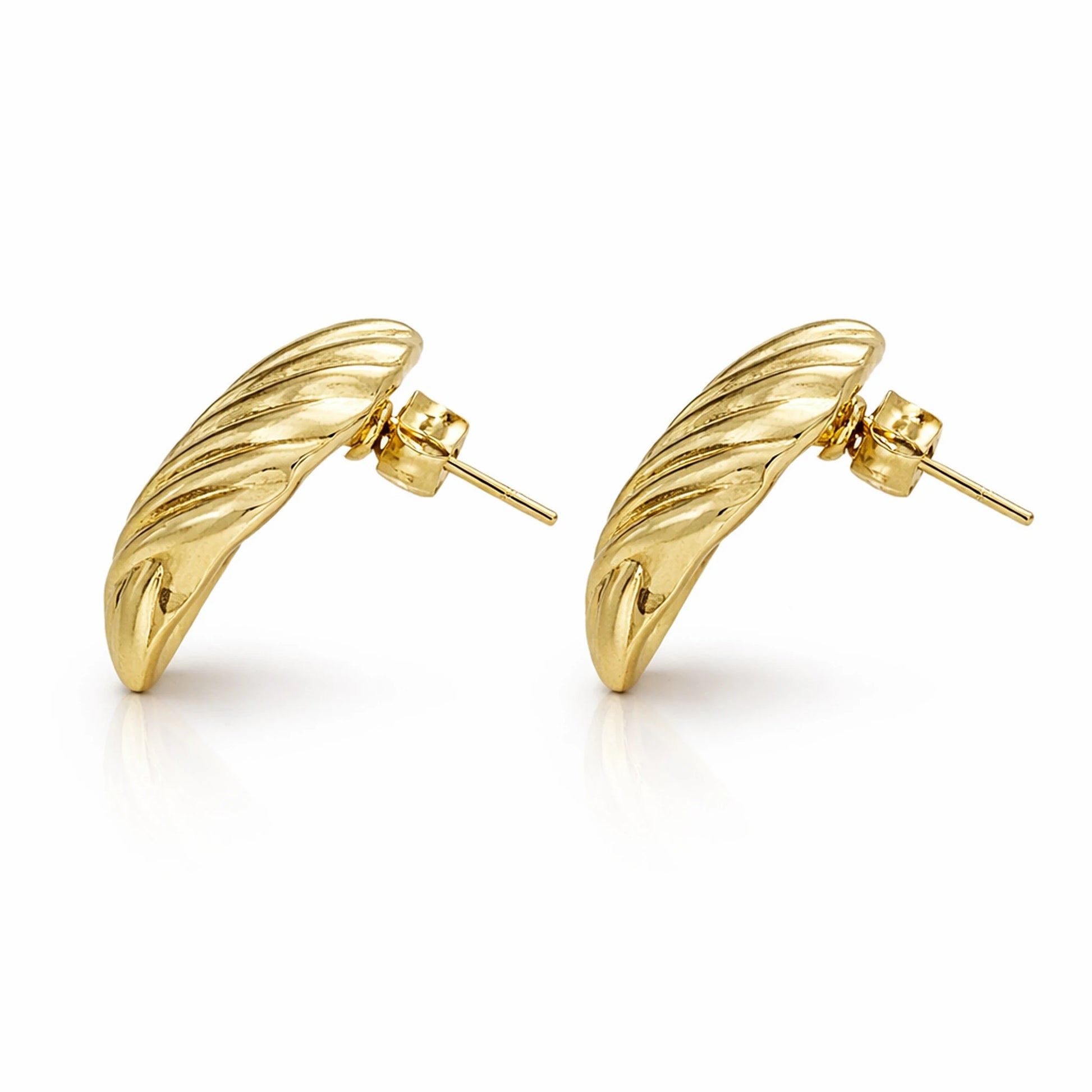Gold wing-shaped earrings on a white background