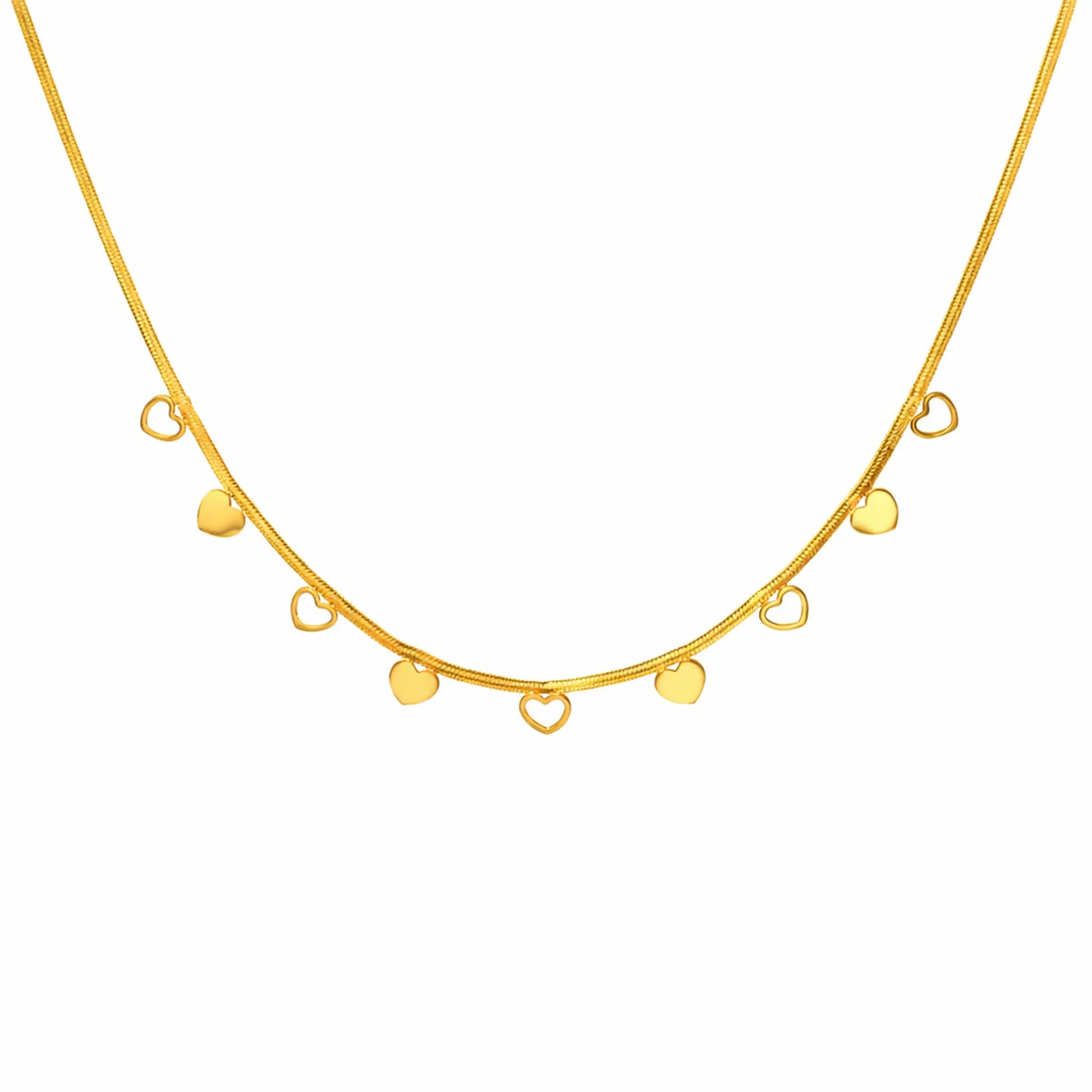 Gold necklace with closed heart and open heart pendants on a white background