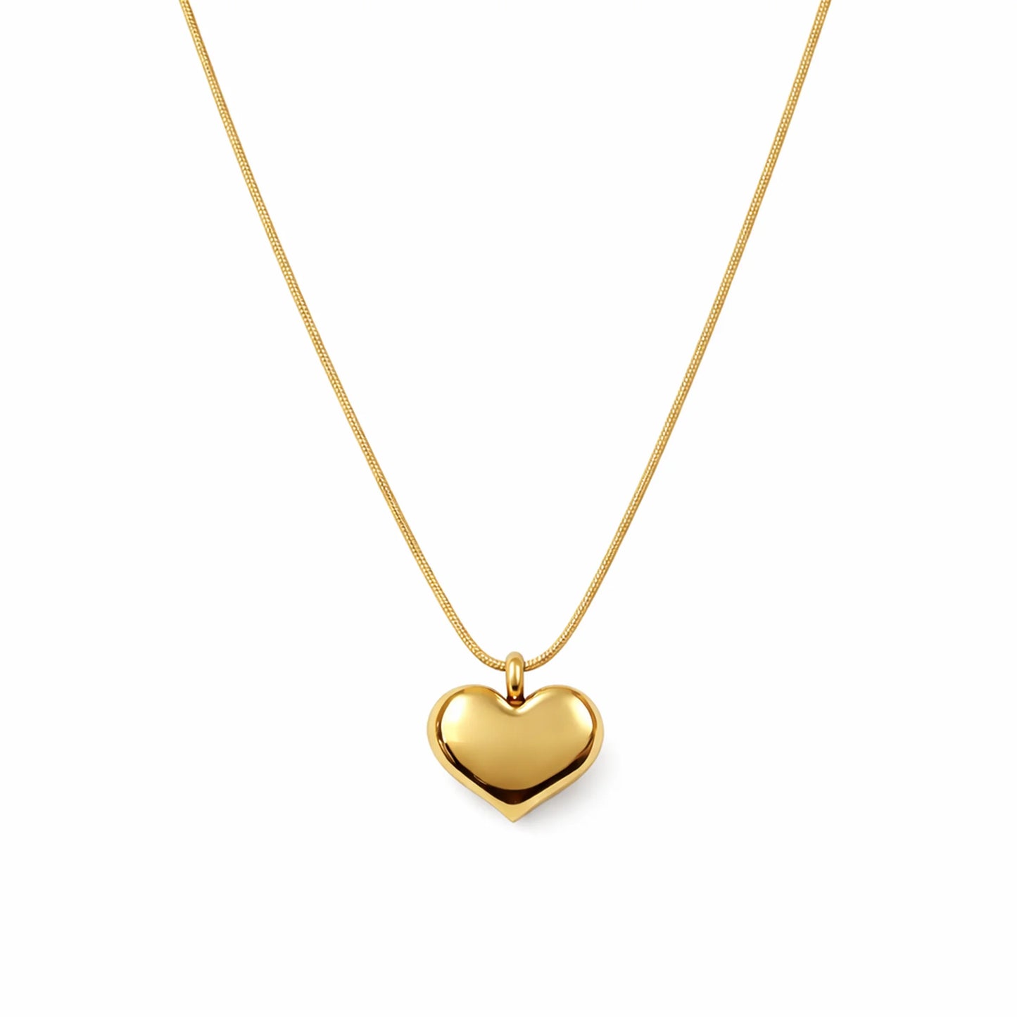 Gold heart-shaped pendant necklace on a white background
