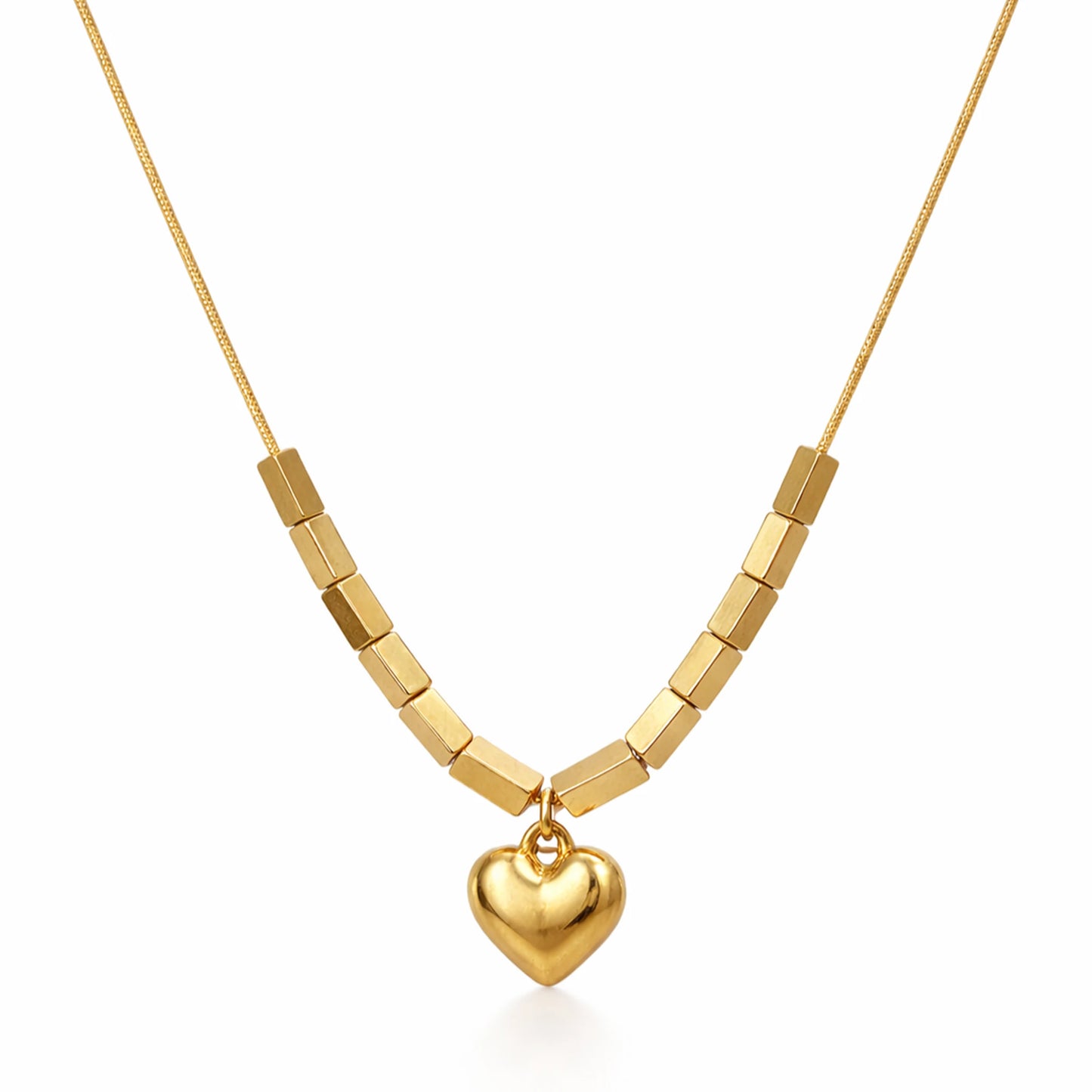 Gold necklace with a heart pendant on a white background