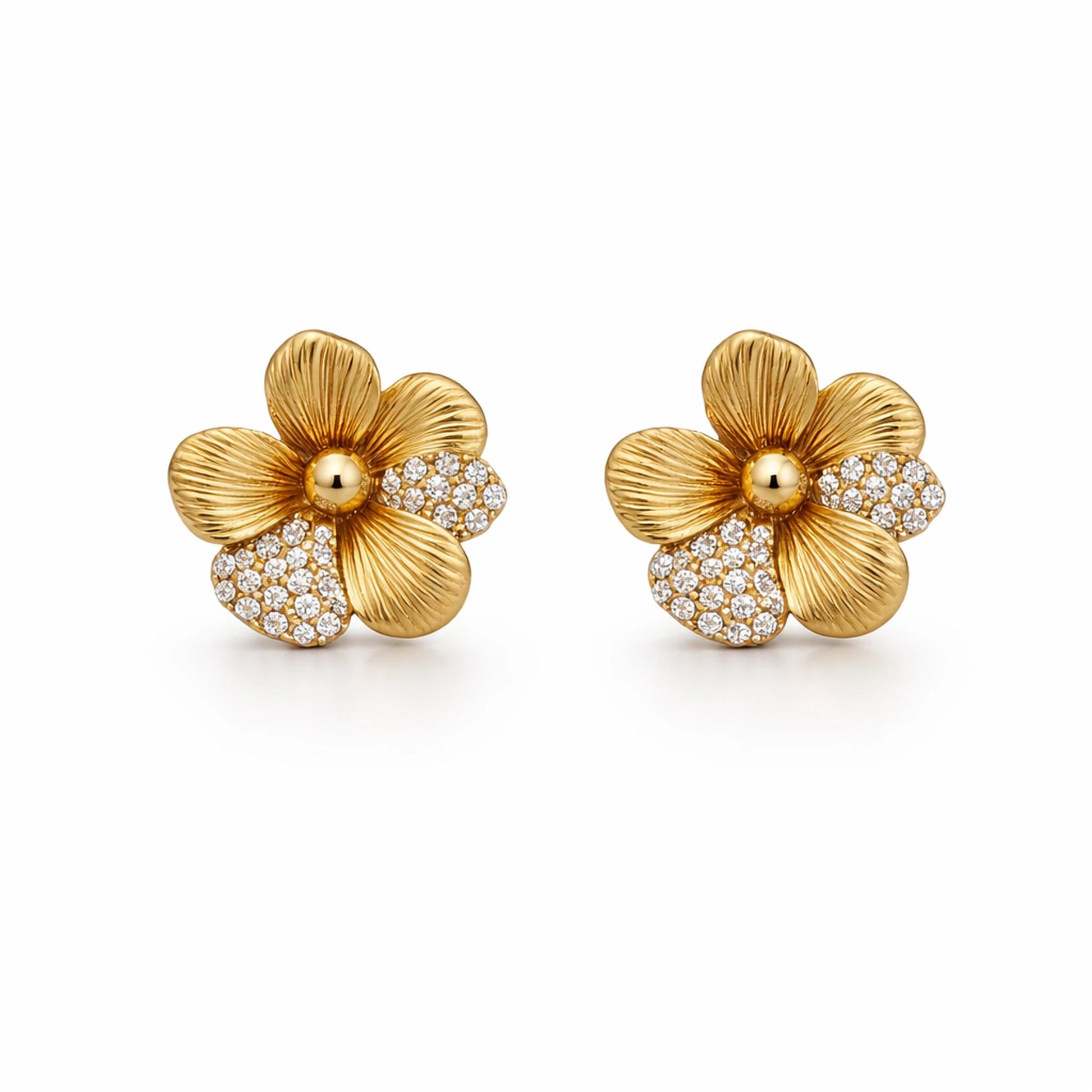 Gold flower-shaped earrings with diamond accents on a white background