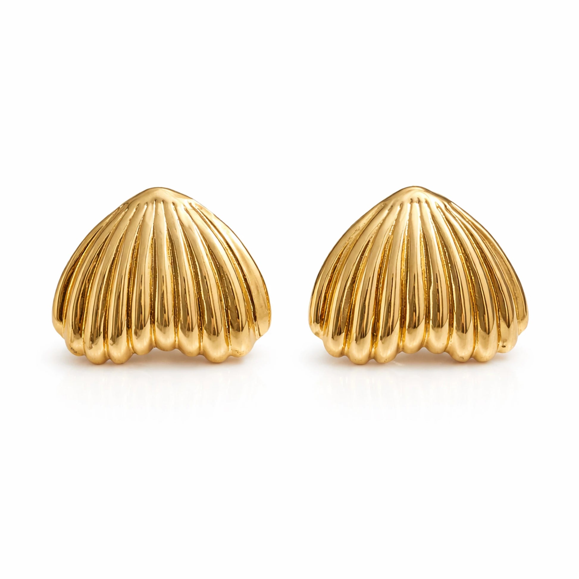 Pair of gold shell-shaped earrings on a white background
