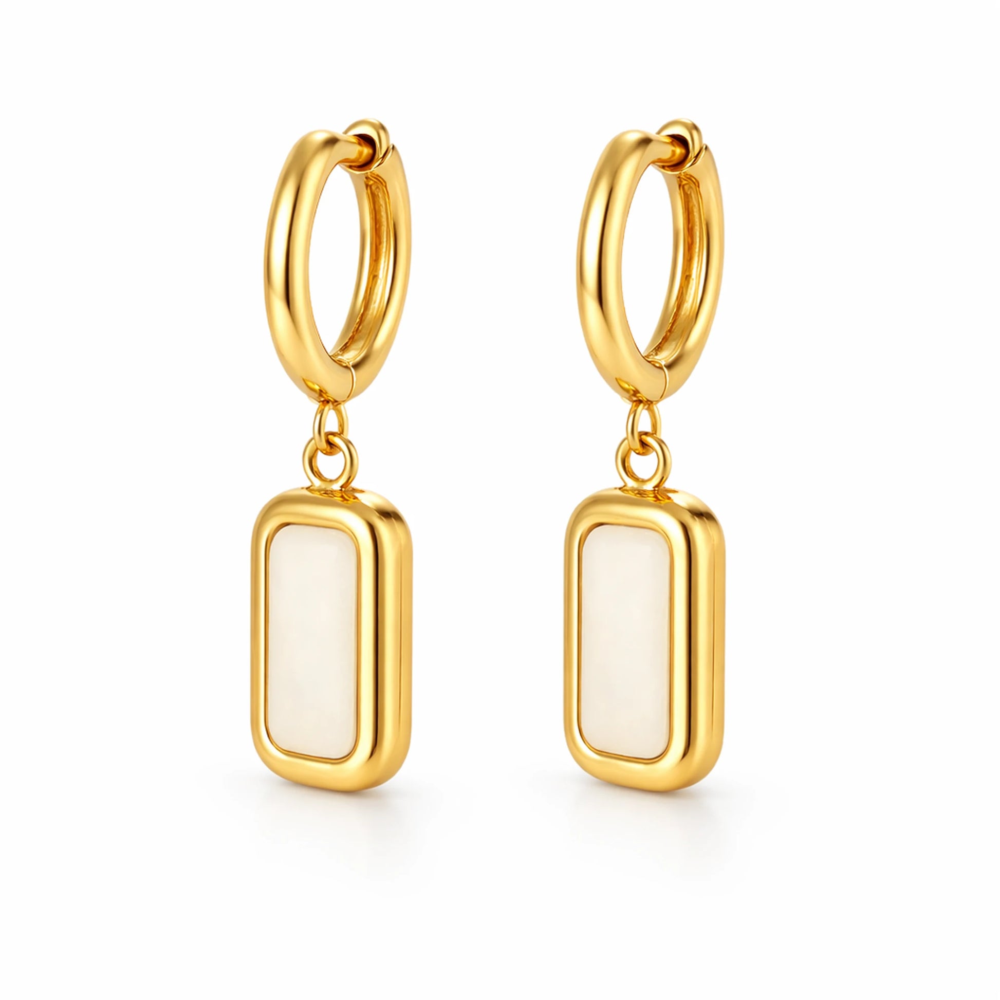 Gold hoop earrings with white stone drops on a white background