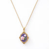 Anti-tarnish gold plated vintage rose necklace with ornate oval frame and floral enamel pendant displayed on a clean white background.