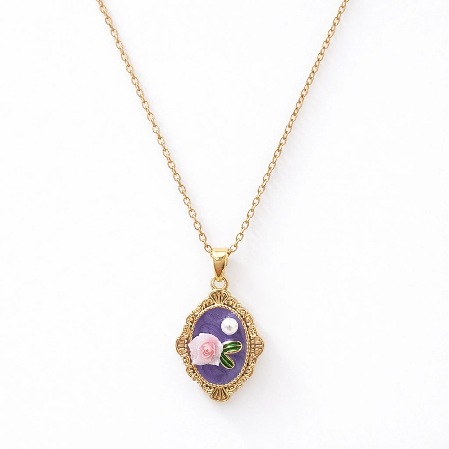 Anti-tarnish gold plated vintage rose necklace with ornate oval frame and floral enamel pendant displayed on a clean white background.