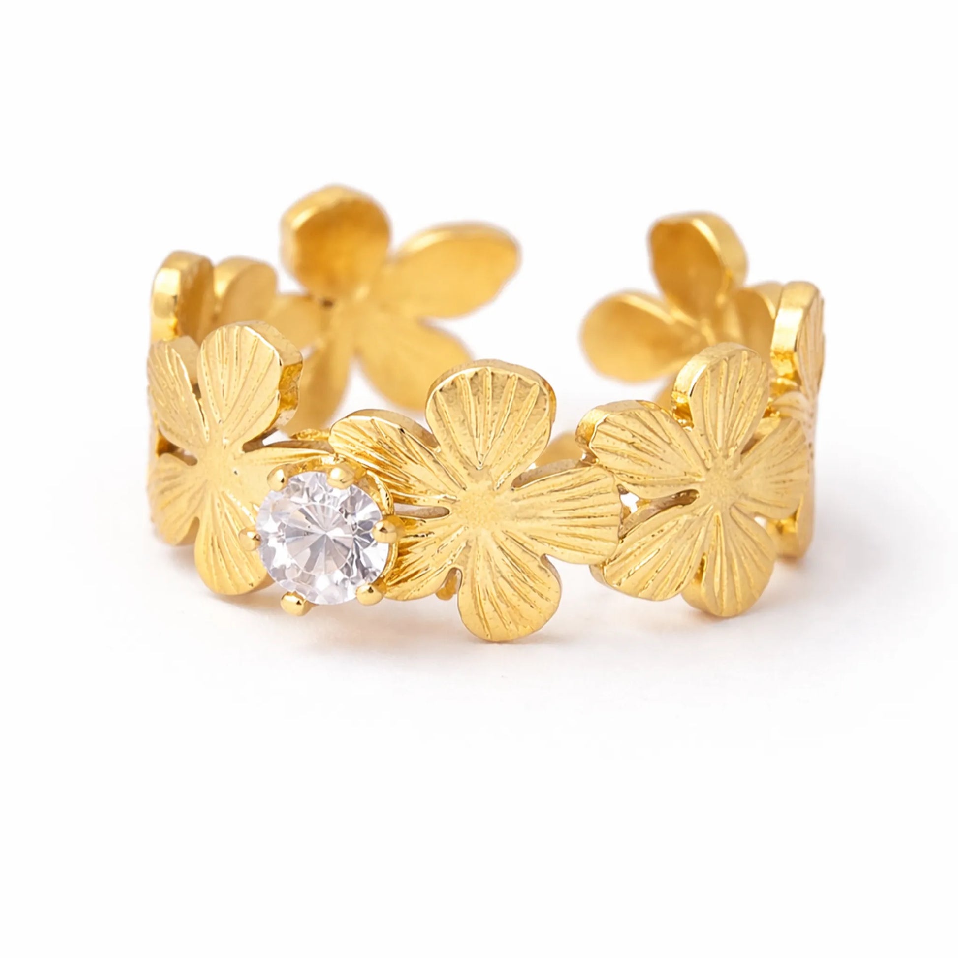 Side view of gold love in bloom floral ring with textured flower petals and solitaire cubic zirconia – yubiraa