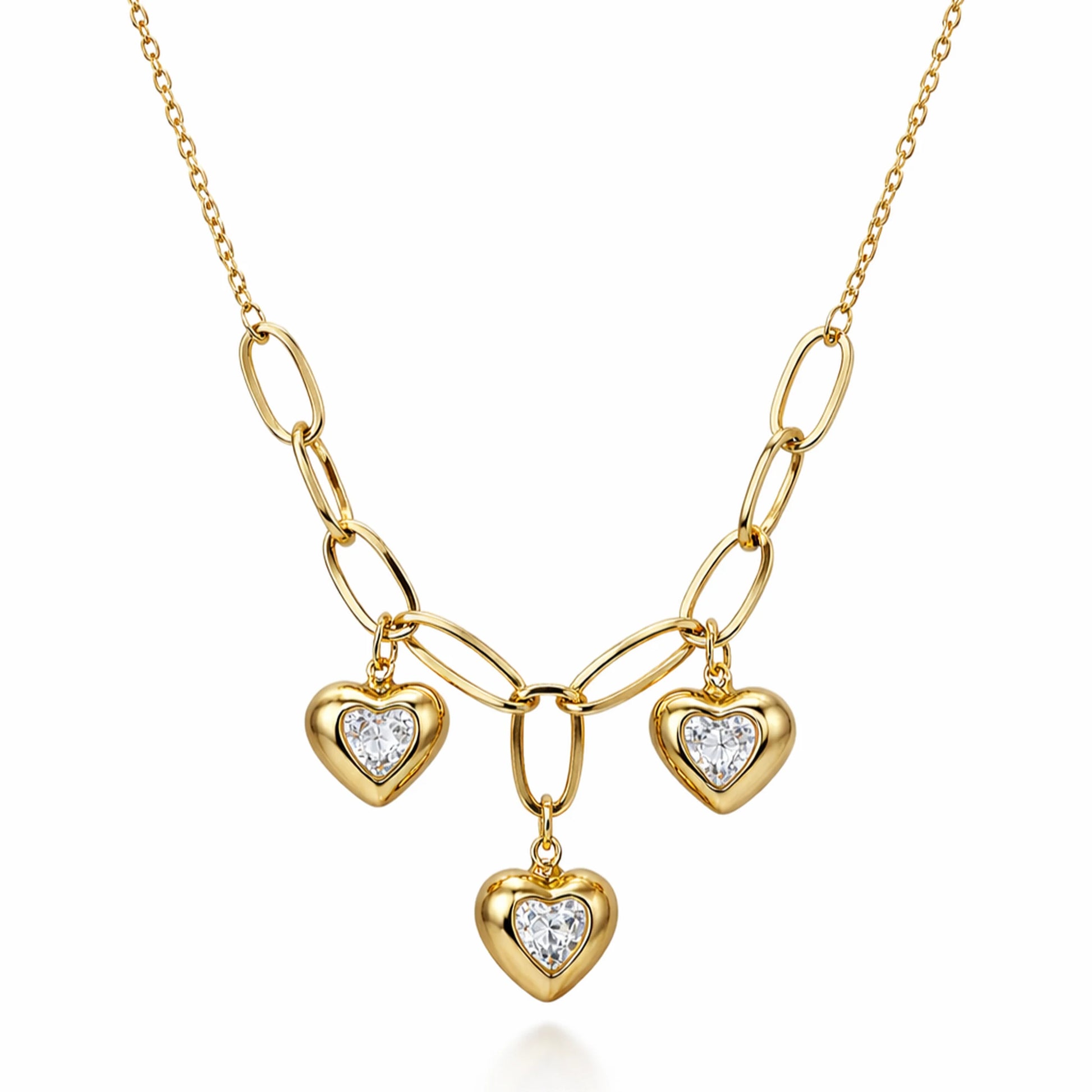Gold necklace with heart-shaped pendants on a white background