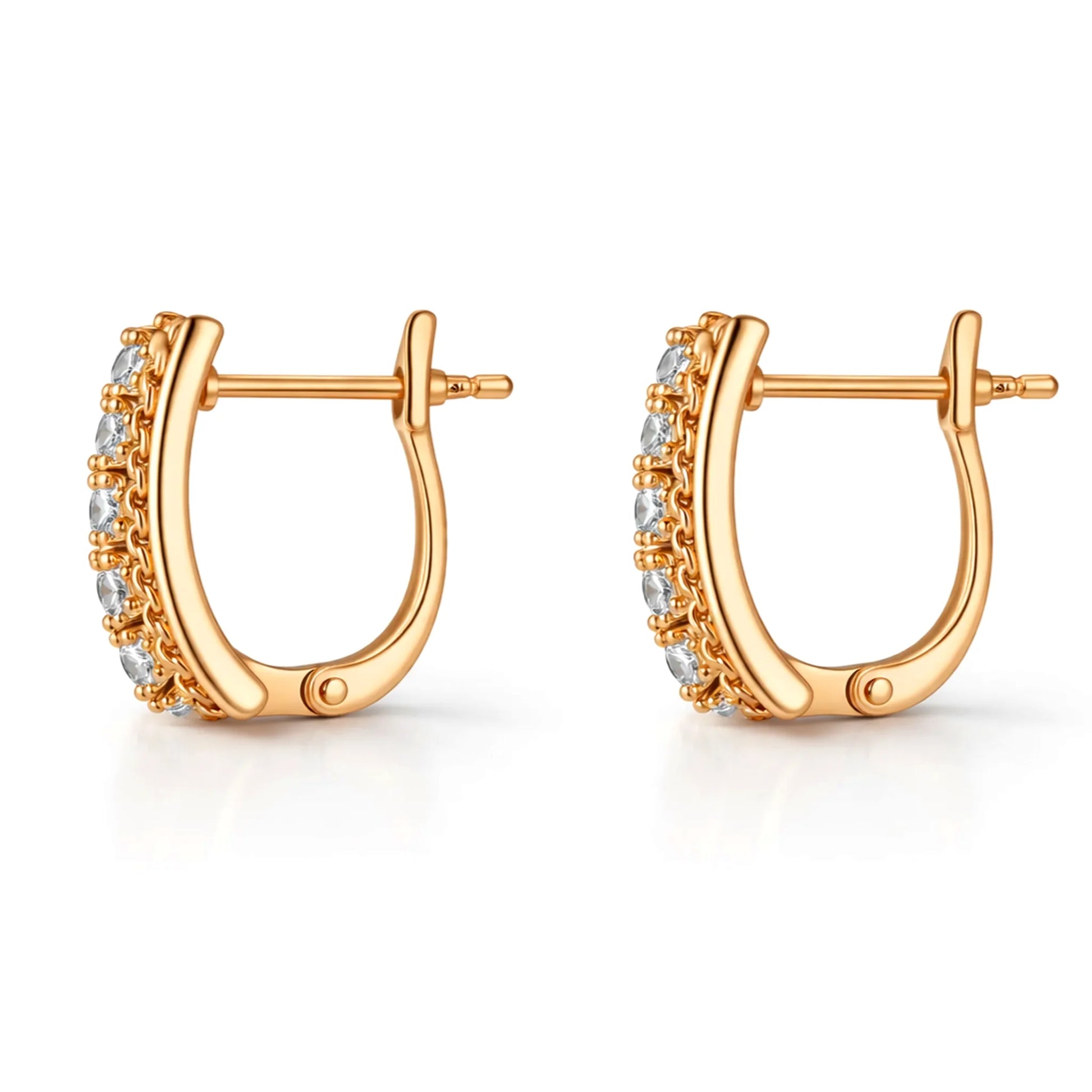 YUBIRAA gold huggie hoop earrings with chain texture and diamond detailing, side view on white background