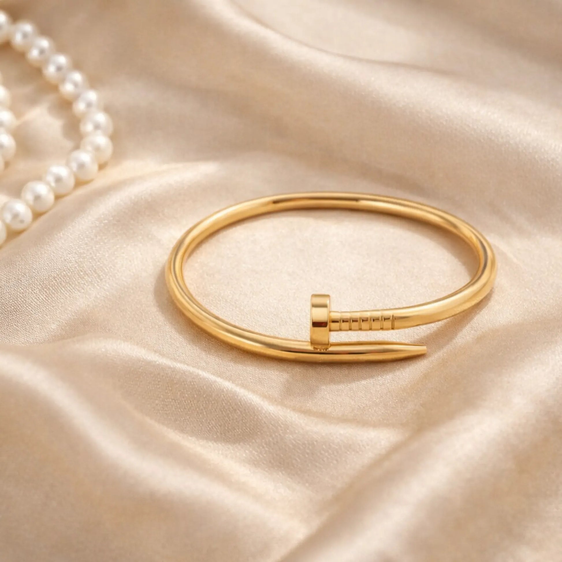 YUBIRAA Classic Gold Nail Bracelet styled for modern everyday wear