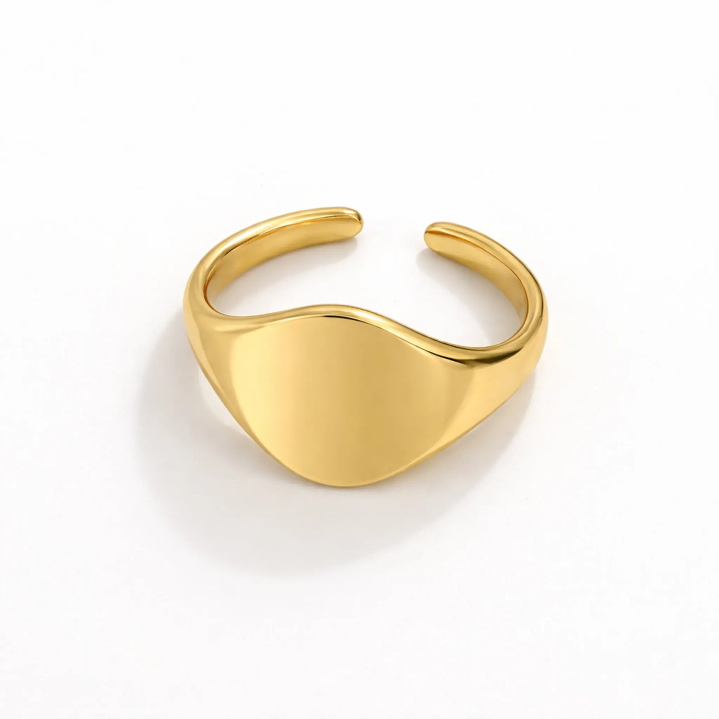 Gold adjustable signet ring with open band and minimal smooth design