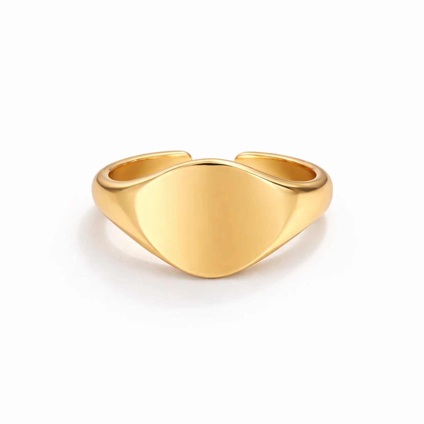 Gold adjustable signet ring with smooth polished surface on white background