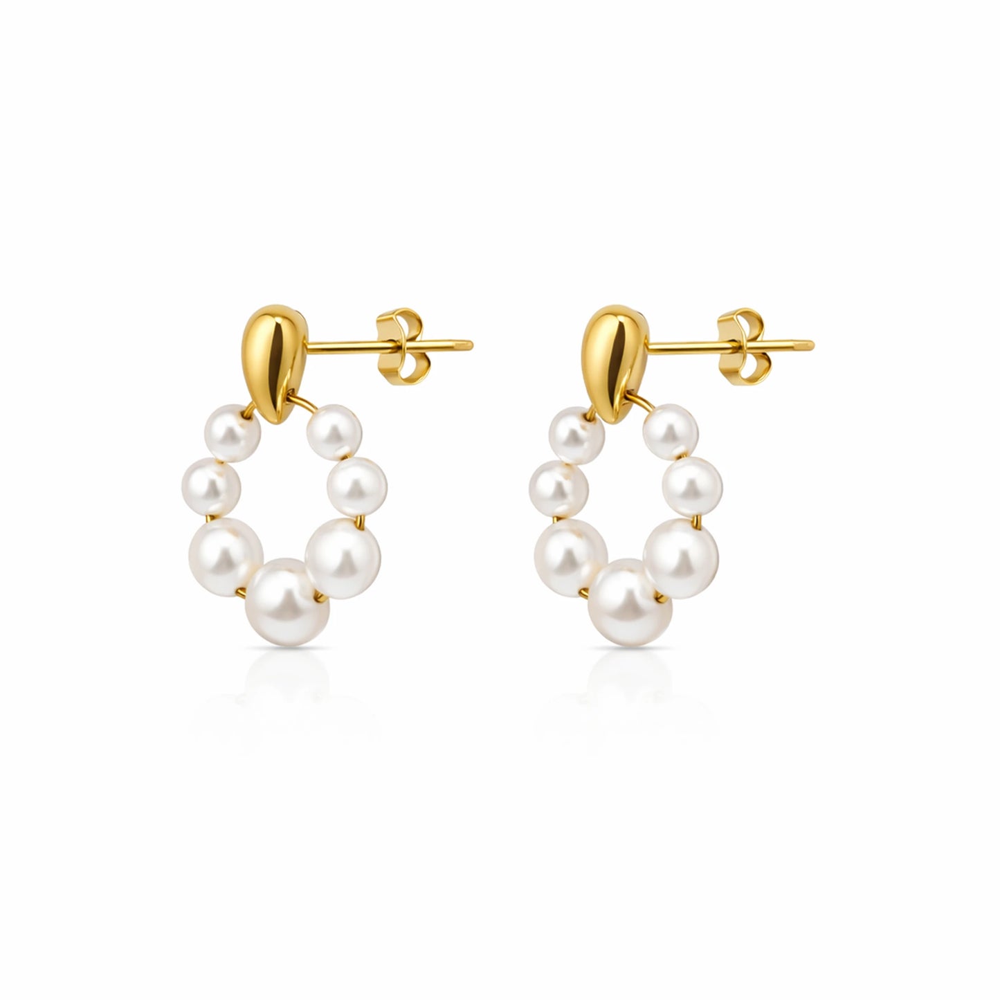 Gold hoop earrings with pearl beads on a white background