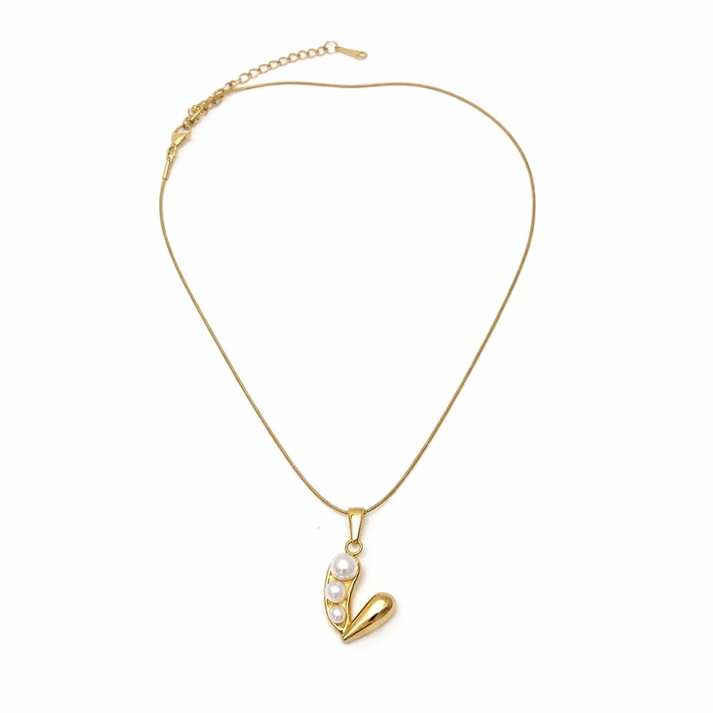 Gold necklace with a v-shaped pendant on a white background