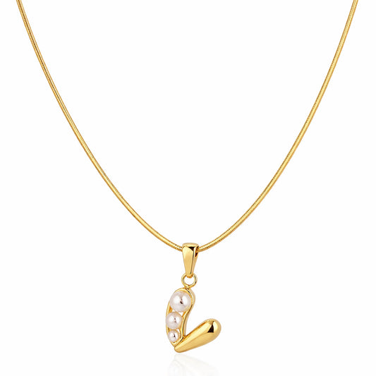 Gold necklace with a v shaped pendant on a white background