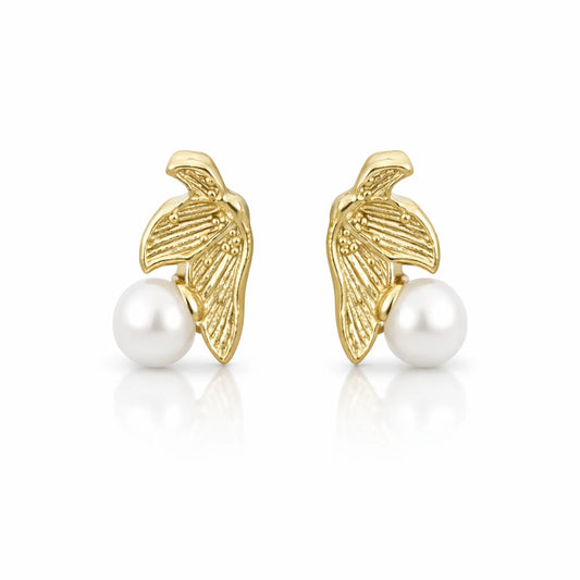 Front view of YUBIRAA gold pearl leaf earrings with textured leaf design and round pearl accent in anti tarnish gold polish