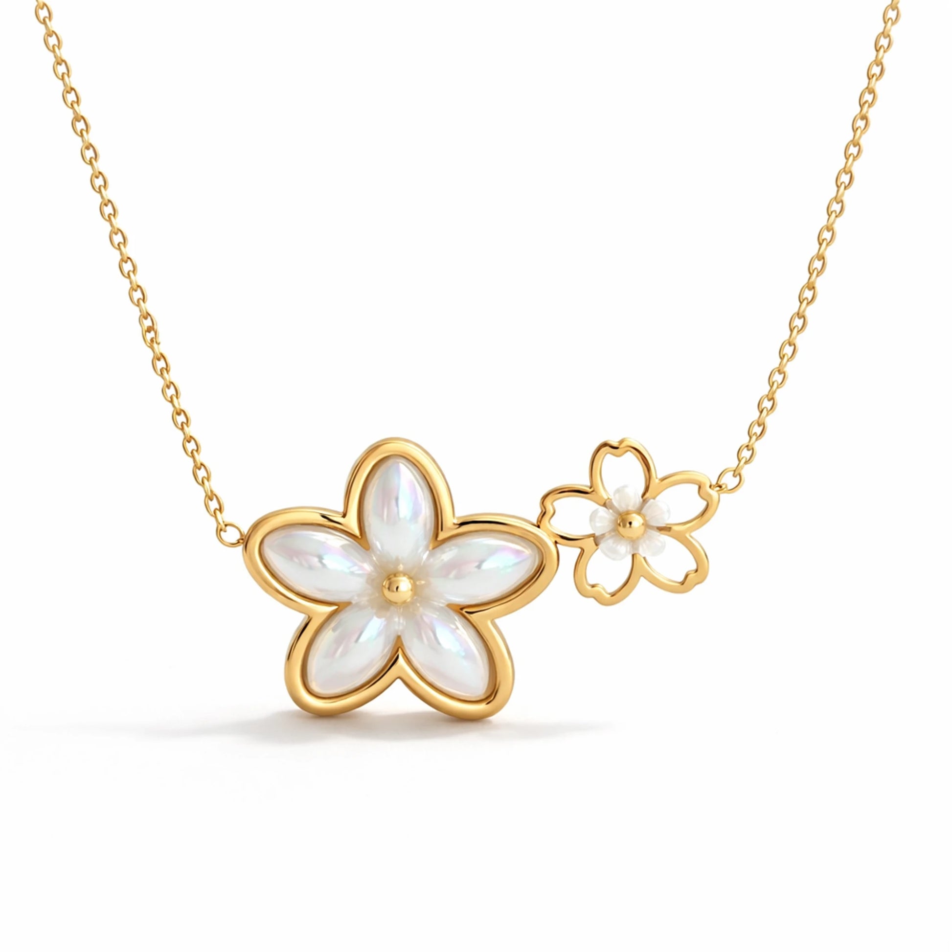 Gold necklace with flower-shaped pendants on a white background