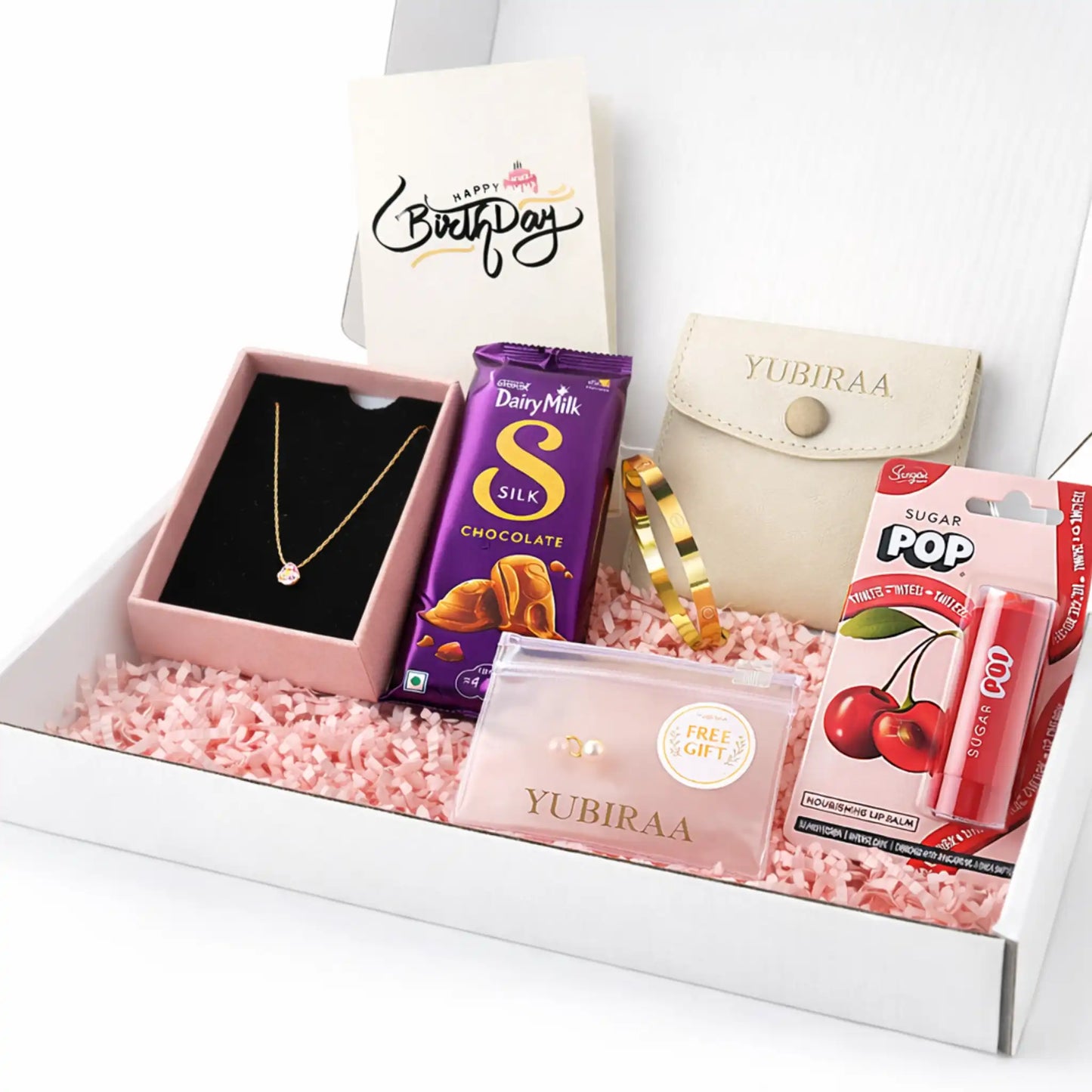 yubiraa anti tarnish Gift box with jewelry, chocolate, lip balm, free gift and personalised msg card items on a white background